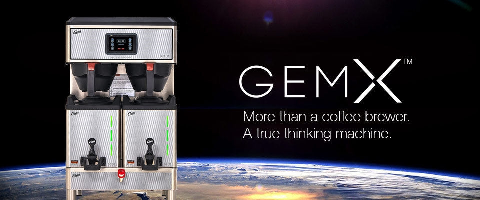 A person holds the iconic Curtis Filter Coffee Flask