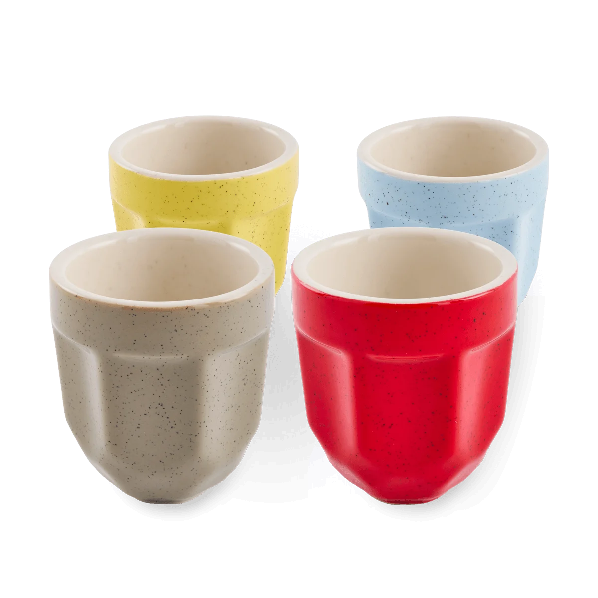 Four textured porcelain espresso cups in beige, yellow, light blue, and red