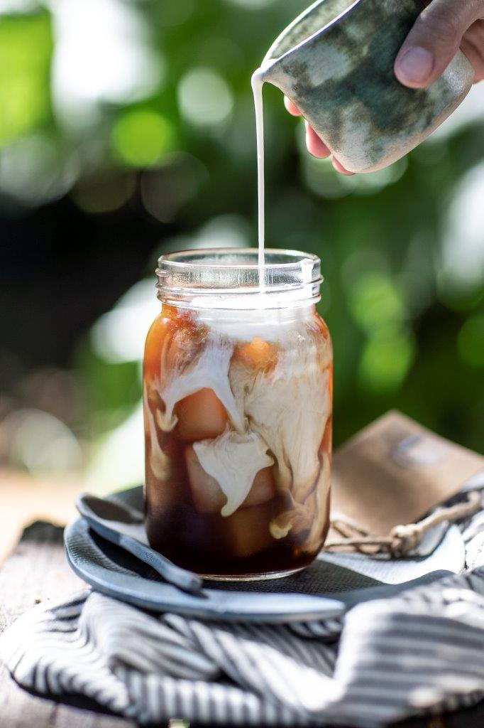 Cold brew coffee with milk and cream